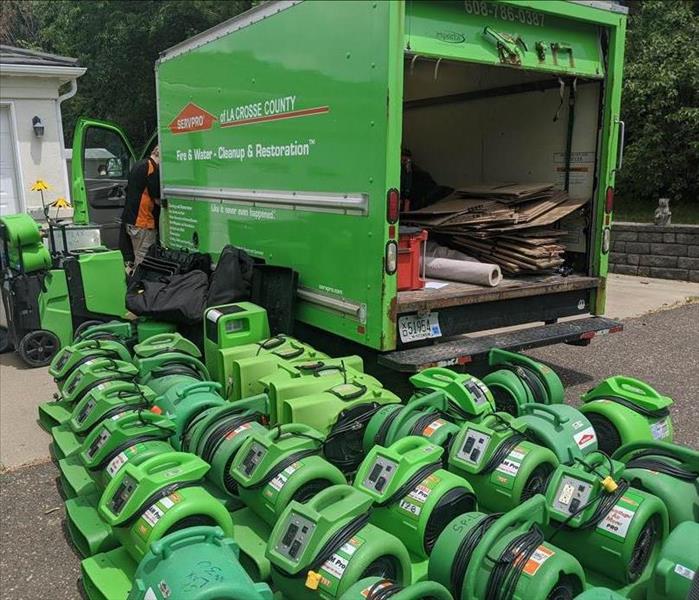 SERVPRO equipment unloaded in front of home